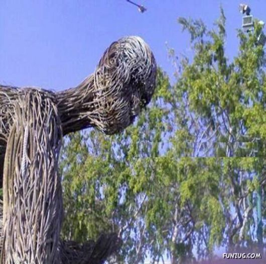 Gigantic Sculpture Of Man From The Ropes