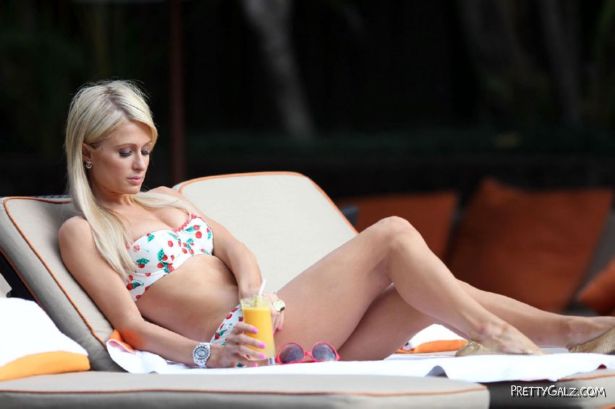Paris Hilton Beats The Summer Heat At The Pool
