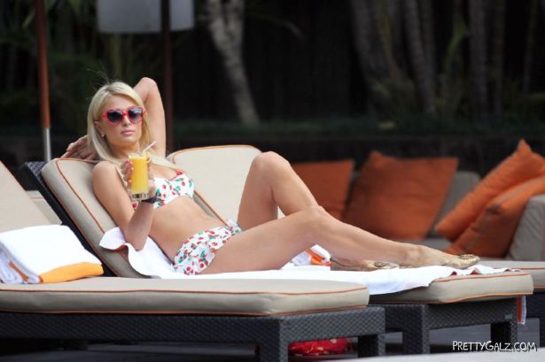 Paris Hilton Beats The Summer Heat At The Pool