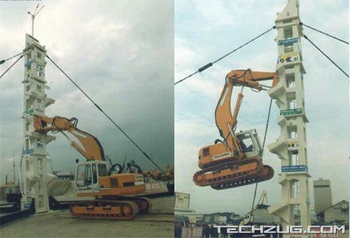 Hydraulic Excavator Climbing up the Tower